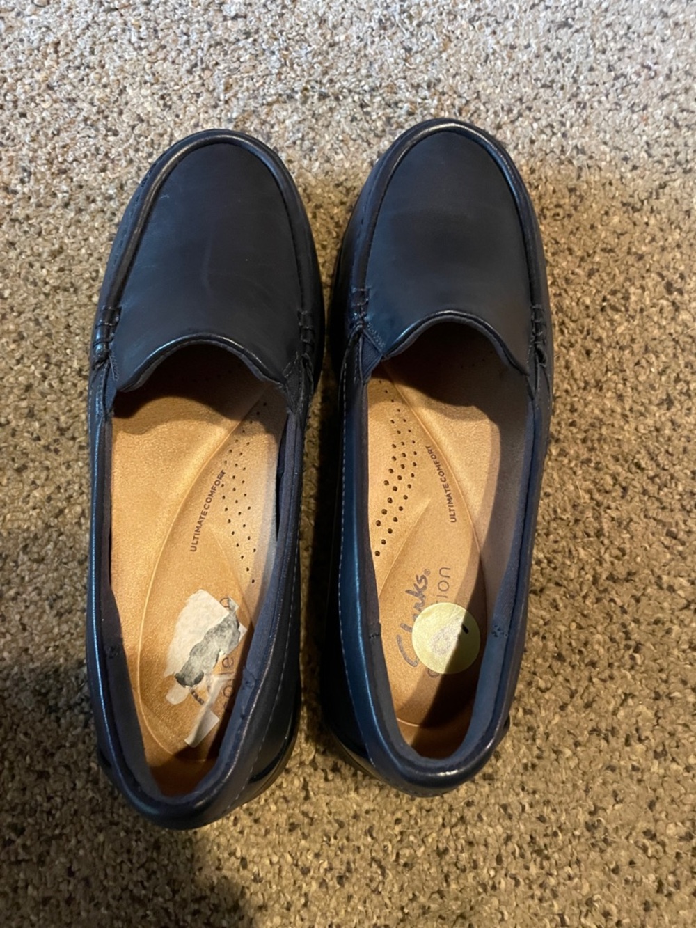 Clarks women’s Navy Leather Slip-On Loafers